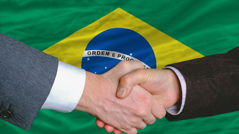 Brazil_flag_with_hands_shaking_91868066_1200px