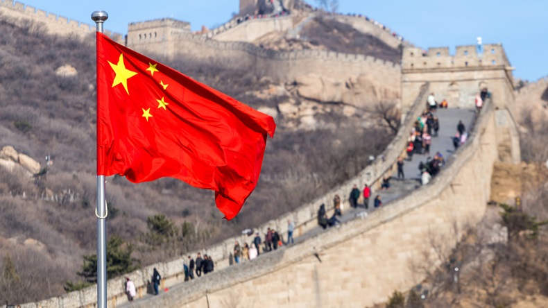 The Great Wall of China on the background and chinese red flag - Image 