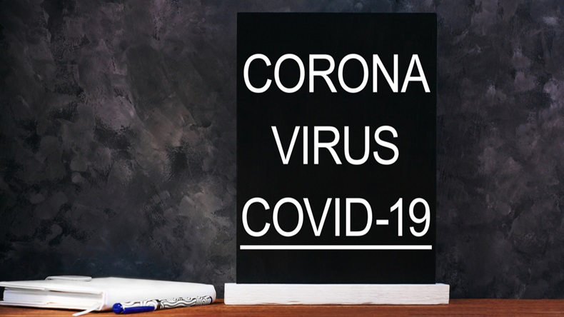 Coronavirus COVID-2019 Disease sign on school chalkboard. 