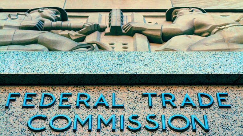 FTC building, Washinton, DC / USA - April 22 2019: The north facade of the Federal Trade Commission building with carved sculpture above an enterence.