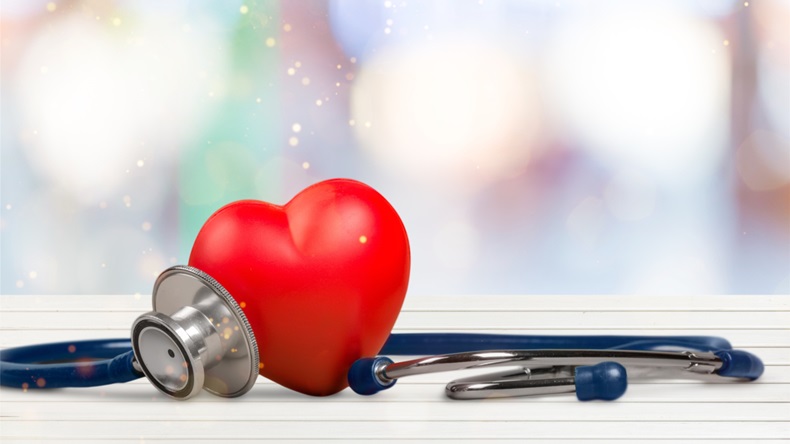 Red heart and a stethoscope on backgrouund - Image 