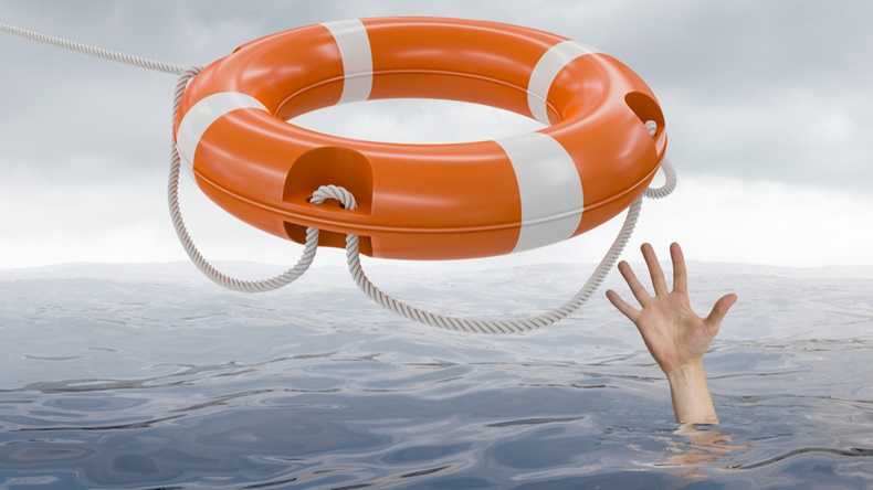 Man is drowning in ocean and is catching life buoy. 3D rendered illustration of life buoy.