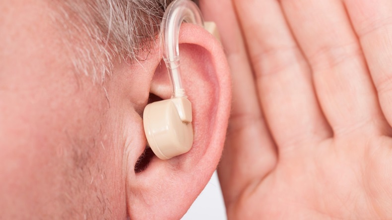 PICTURE OF HEARING AID.