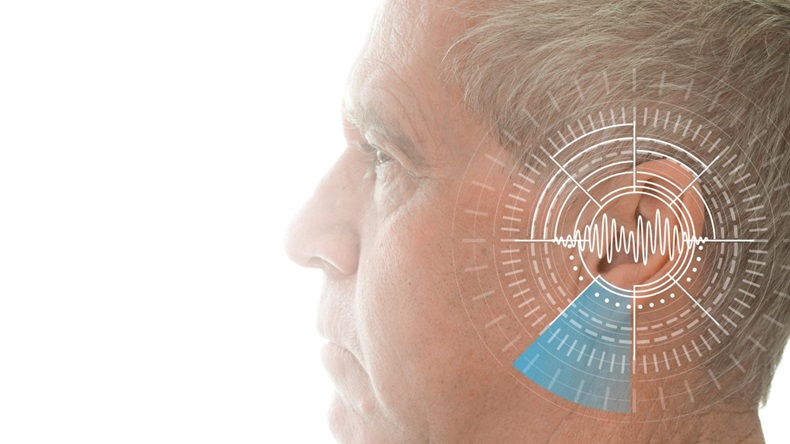Profile of an older man against a white background, with sound waves simulation technology superimposed over his ear.