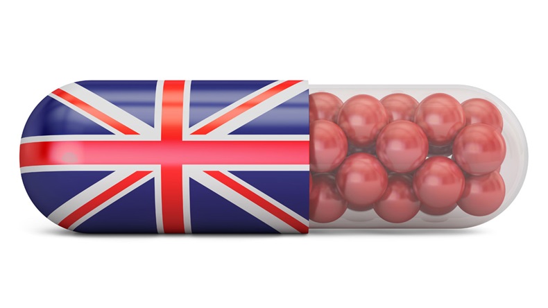 Pill capsule with Great Britain flag. UK health care concept, 3D rendering